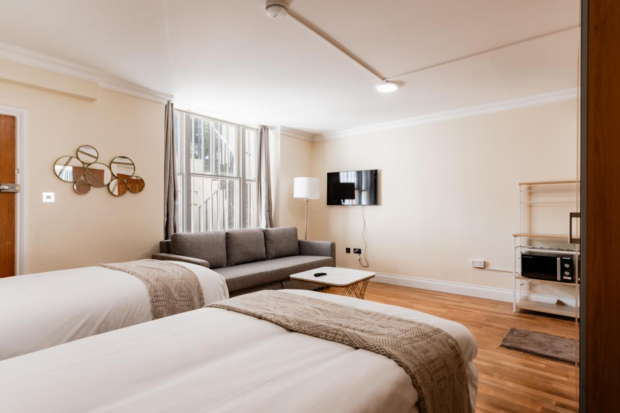 Warm In Queensway Apartamento *